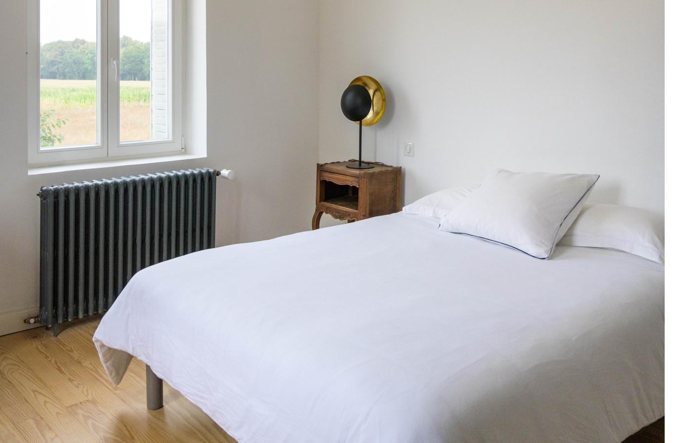 Bedroom with crisp white linen
