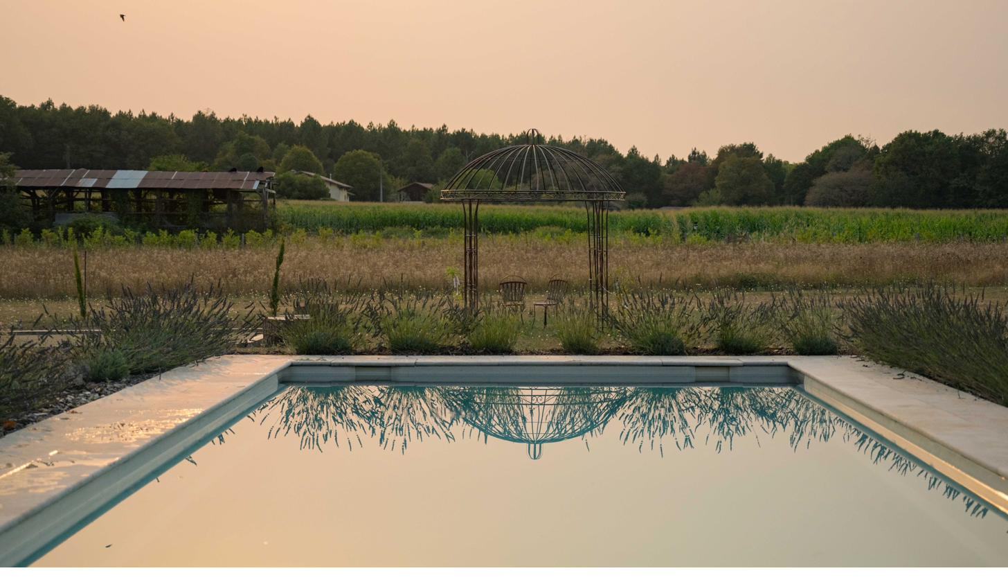 Pool at dusk looking over the fields