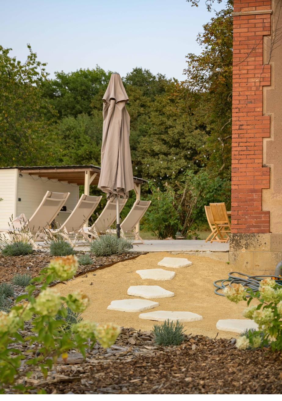 Sun loungers beside the house